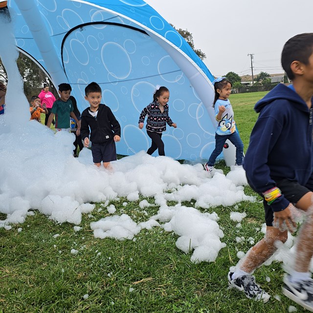 Kids running bubble