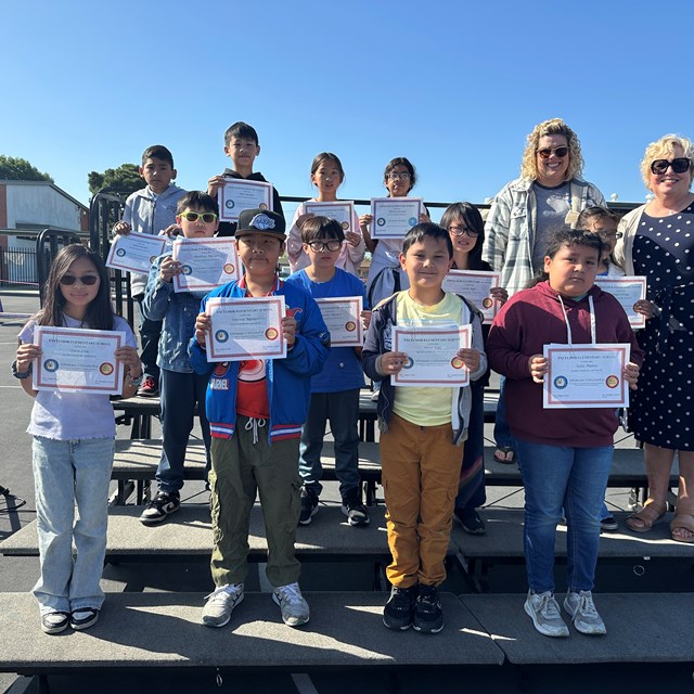 Second Trimester Awards with Mrs. Paski and Principal Carter