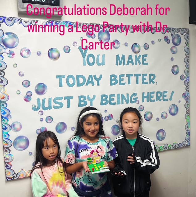 Our lovely friends proudly showing their Lego house!