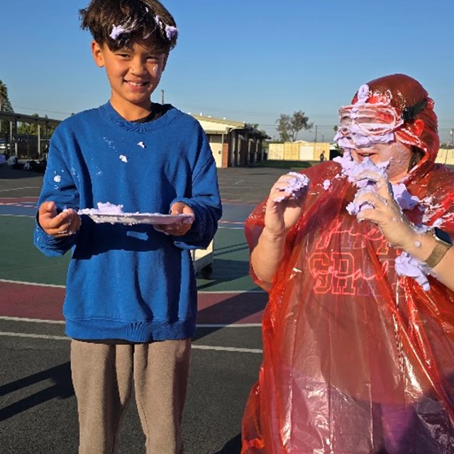 Ms. Cook pie in face